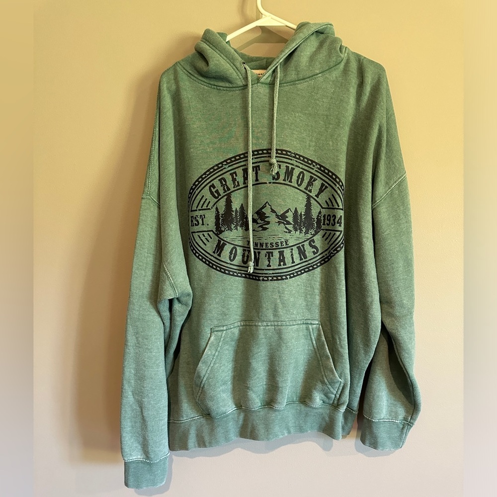 Hooded unisex sweatshirt. Green. Used.
